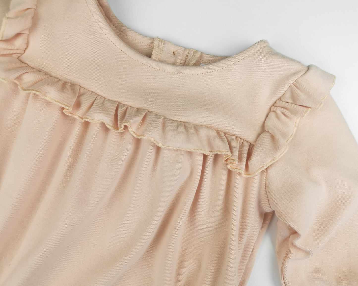 Olivia romper lys fersken